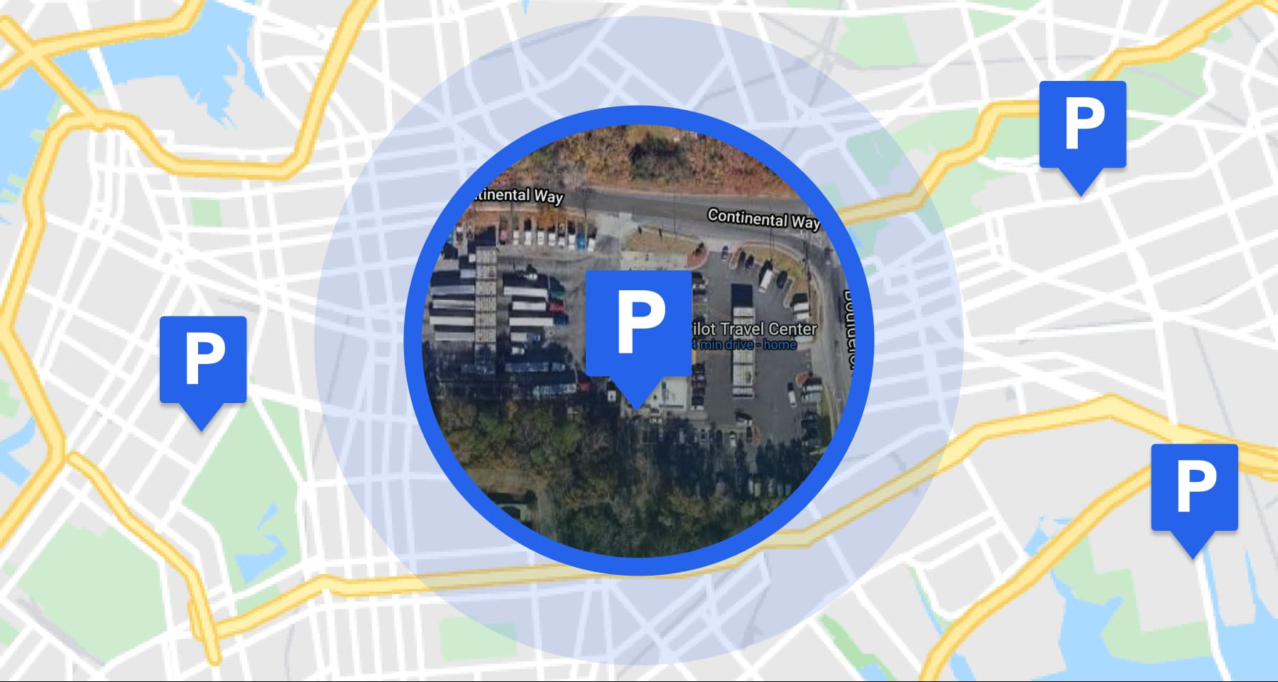 Blue parking icon hovers over Google Earth imaging of a truck park